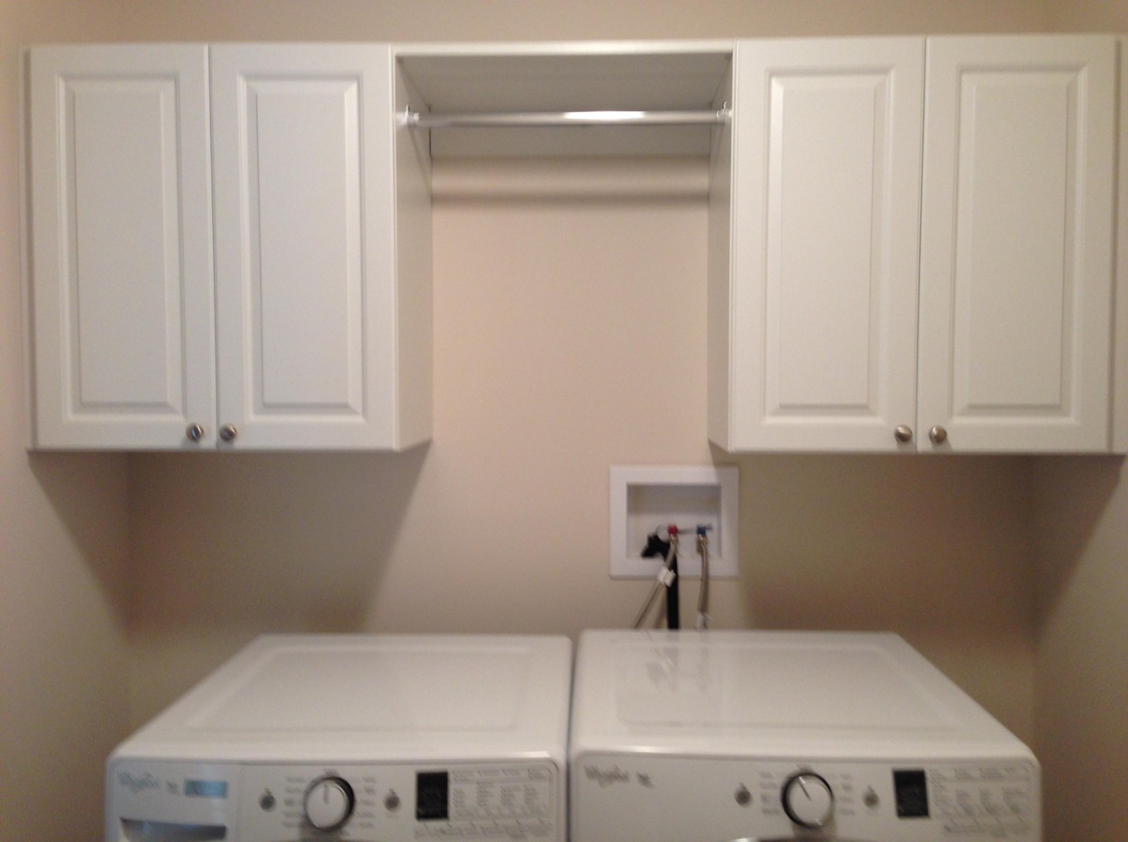 Raised panel in laundry area Creative Closet Solutions